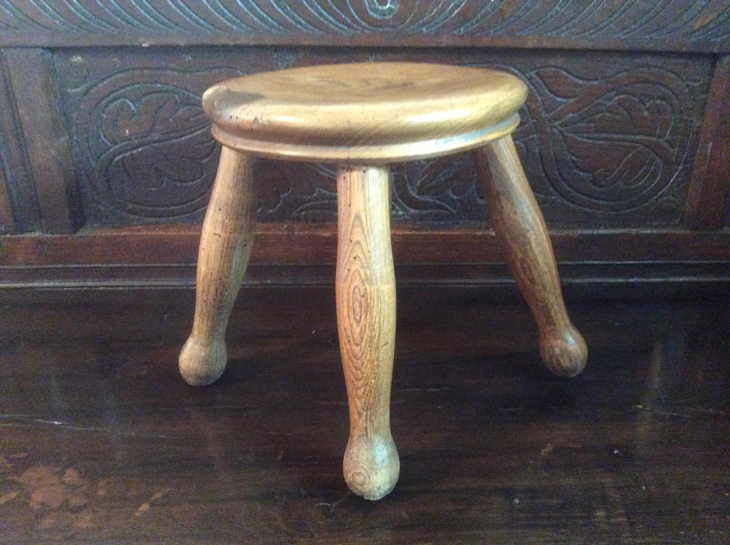 Late 19th century elm milking stool