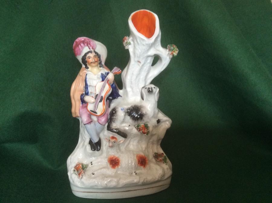 Staffordshire spill vase figure of a musician