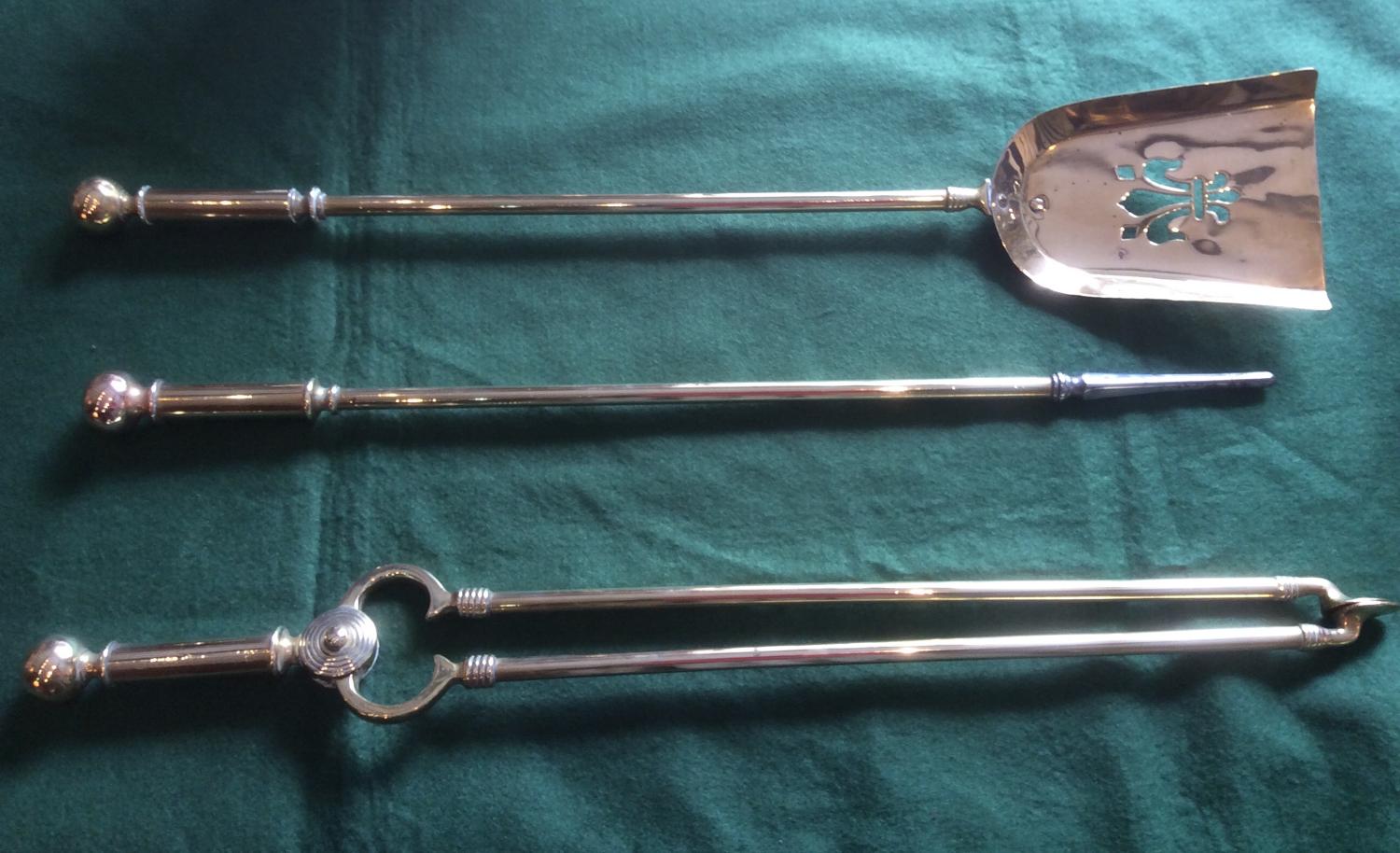 Early 20th century brass fire irons