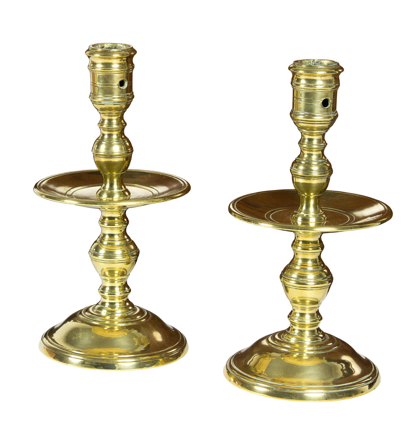 Pair of brass Heemskerk candlesticks