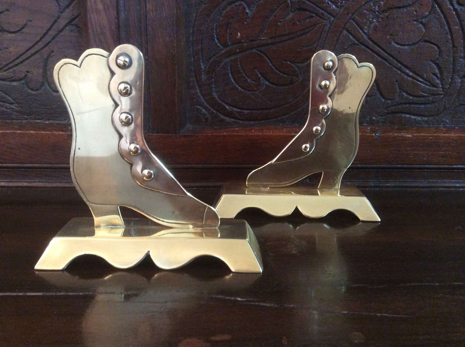 Pair of brass boot chimney ornaments