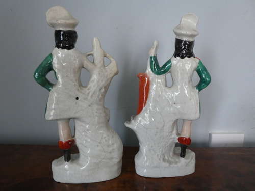 Pair of Staffordshire huntsman figures