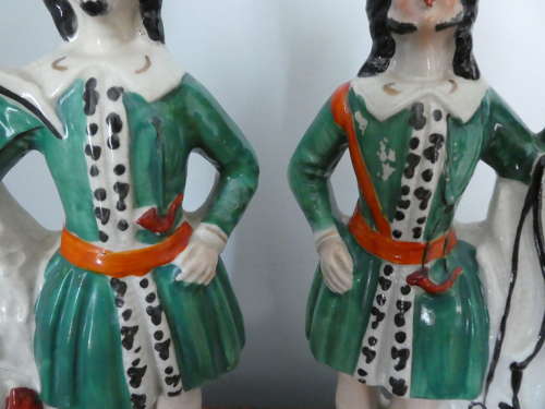 Pair of Staffordshire huntsman figures