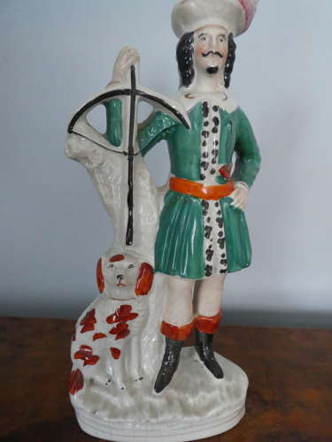 Pair of Staffordshire huntsman figures
