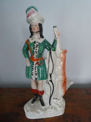 Pair of Staffordshire huntsman figures