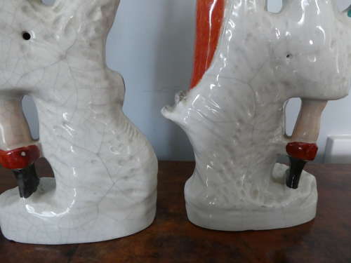 Pair of Staffordshire huntsman figures