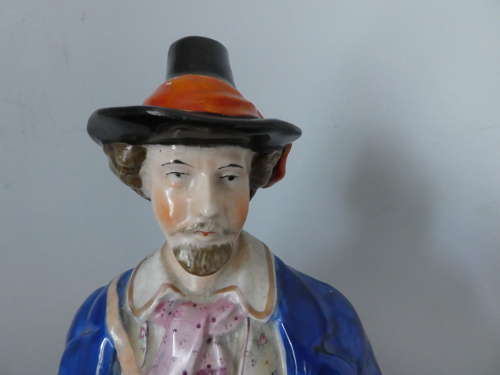 Staffordshire Huntsman figure with spaniel