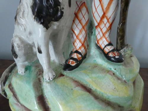 Staffordshire Huntsman figure with spaniel