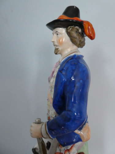 Staffordshire Huntsman figure with spaniel