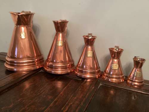 SET OF FIVE COPPER MEASURES WITH ARMORIAL