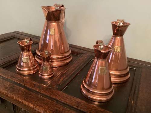 SET OF FIVE COPPER MEASURES WITH ARMORIAL