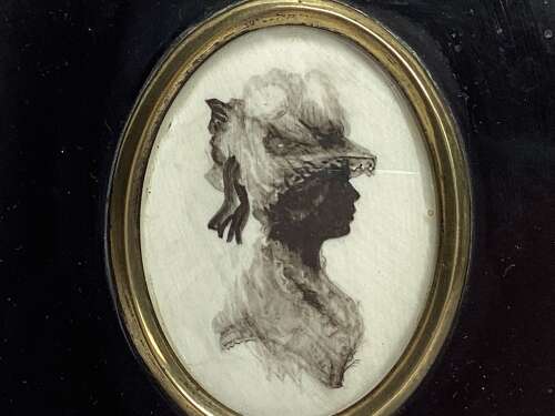 REGENCY PERIOD SILHOUETTE OF A LADY WEARING A HAT WITH RIBBONS