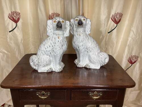 PAIR OF LARGE STAFFORDSHIRE SPANIELS