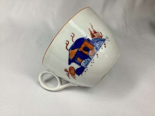 NEW HALL CUP AND SAUCER IN IMARI COLOURS